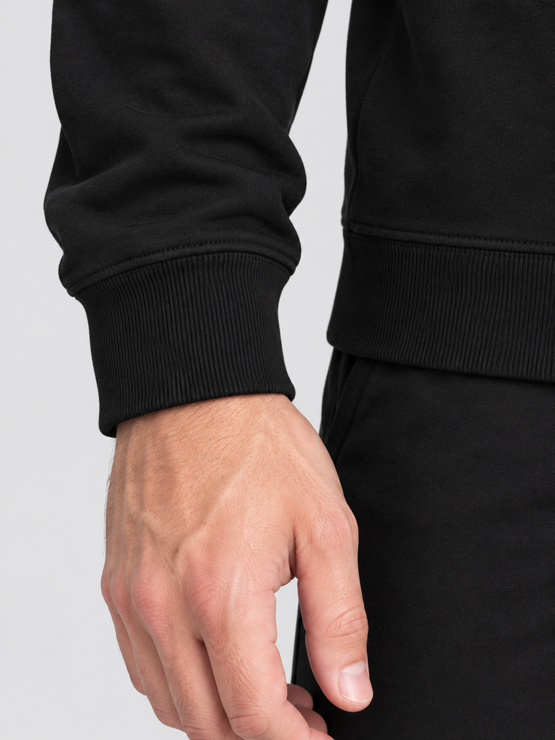 Sweat col rond unisexe Athlete — detail porte — maquette illustrative